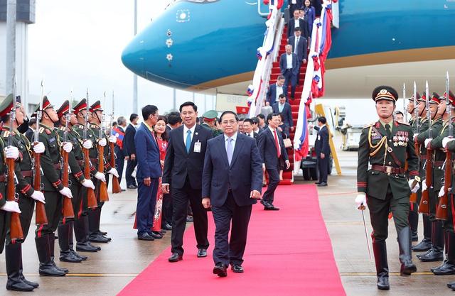 Lễ đón Thủ tướng Phạm Minh Chính thăm chính thức CHDCND Lào - Ảnh 3.