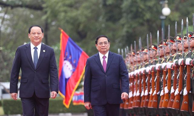 Lễ đón Thủ tướng Phạm Minh Chính thăm chính thức CHDCND Lào - Ảnh 1.