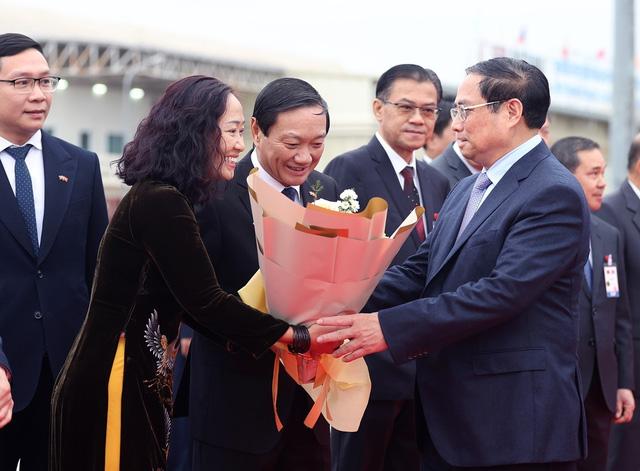 Lễ đón Thủ tướng Phạm Minh Chính thăm chính thức CHDCND Lào - Ảnh 7.
