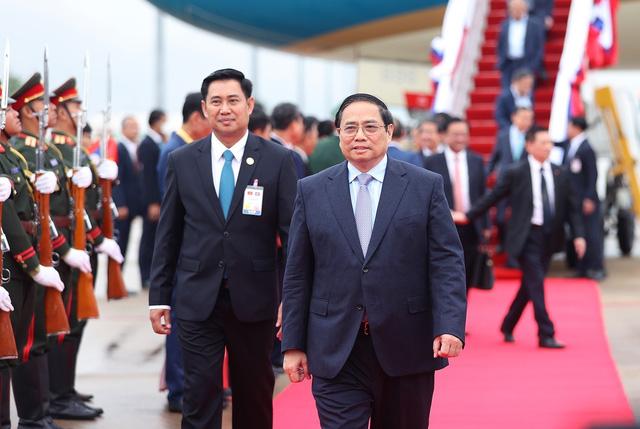 Lễ đón Thủ tướng Phạm Minh Chính thăm chính thức CHDCND Lào - Ảnh 2.