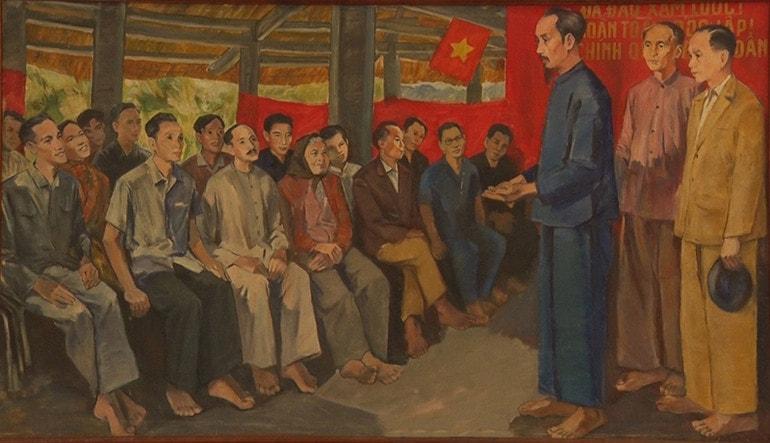 Chủ tịch Hồ Chí Minh nói chuyện với đại biểu Quốc dân Đại hội tại Đình Tân Trào. (Tranh sơn dầu: Họa sĩ Cao Thương)